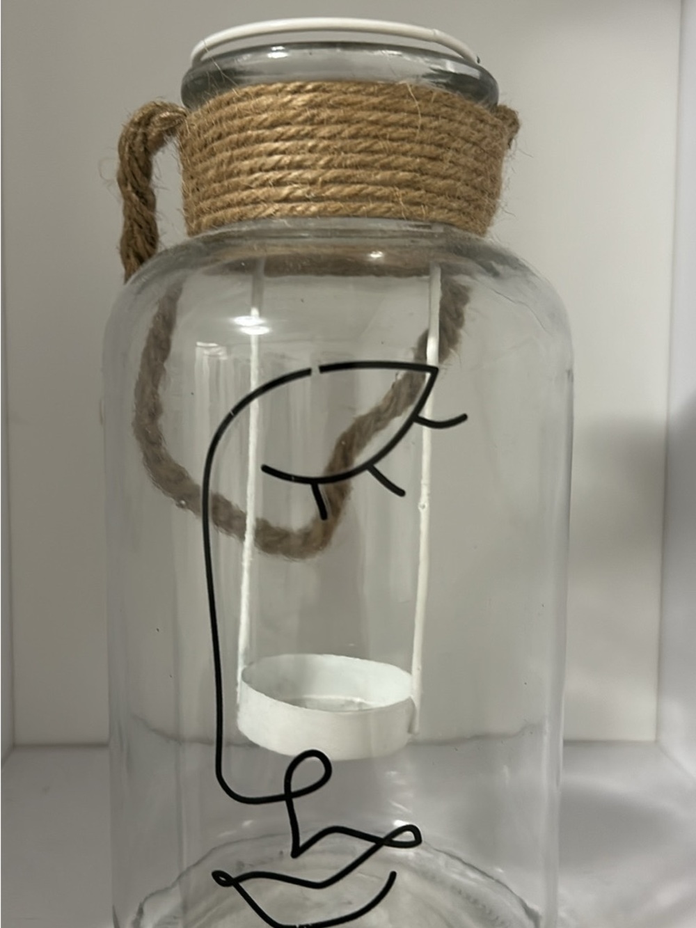 Clear Glass Lantern with Rope Accent and Black Face Design